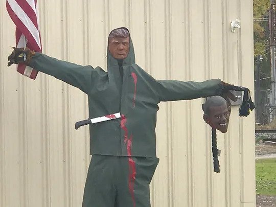 Fowlerville, Michigan: HALLOWEEN Display of Trump Holding Obama’s Head on Noose Draws Outrage — No Outrage Over the Bloodied Machete Sticking Out of Trump’s Chest