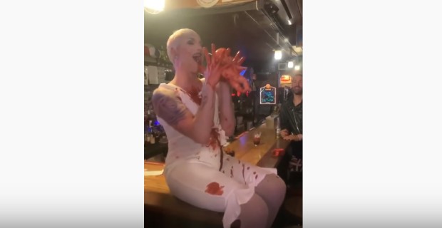Video: New York Drag Queen Simulates Cutting Baby Out of “Her” Womb, Drinking Blood